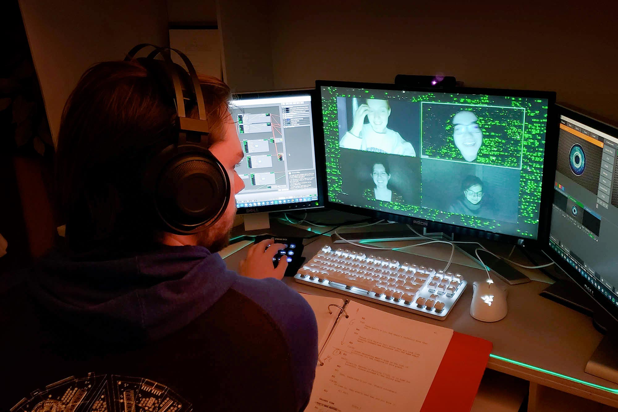 Andy Carluccio working on a computer during a zoom meeting