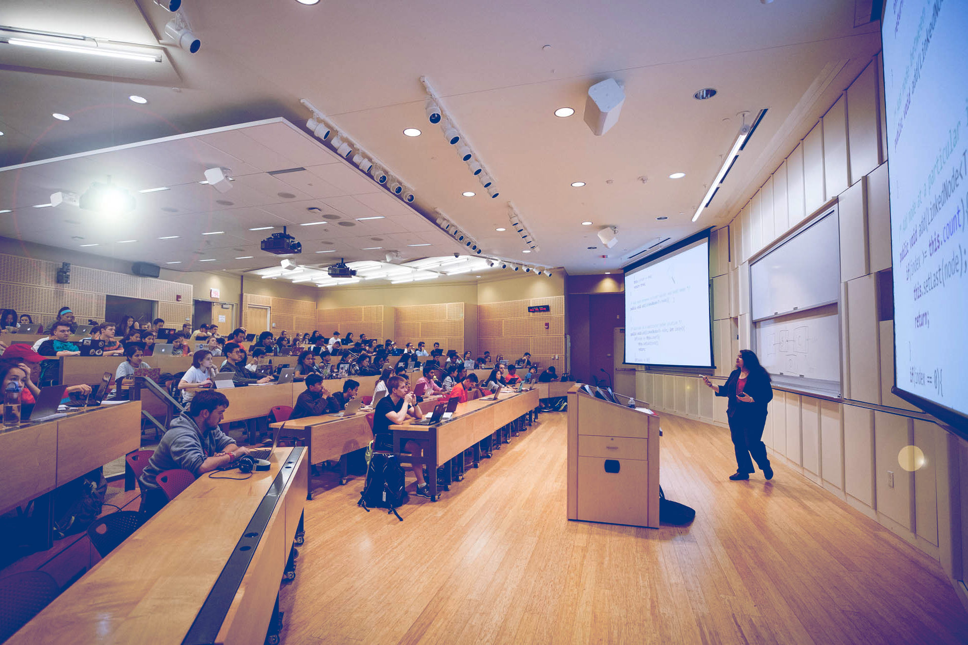 Nadia Basit teaching in front of a class