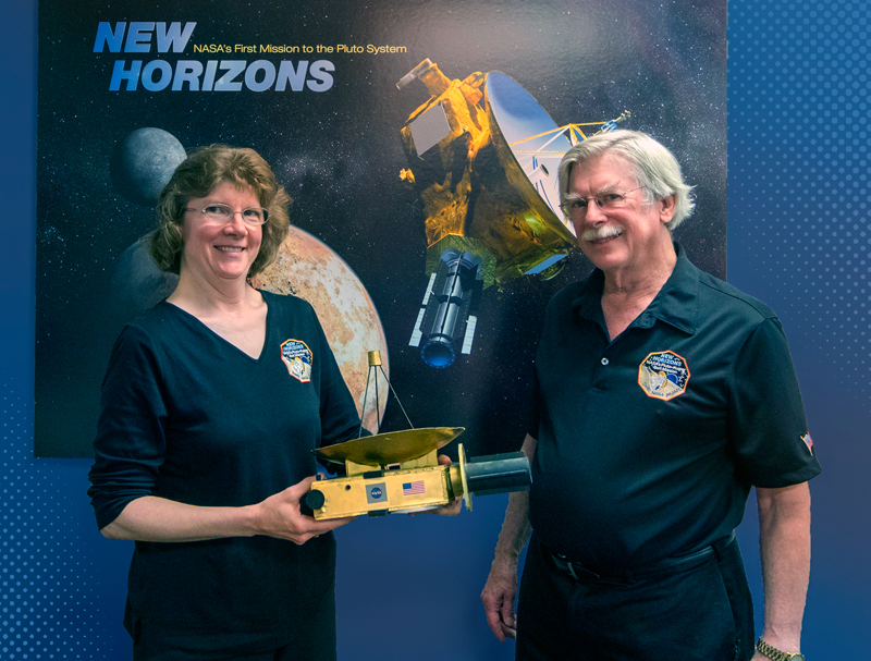 Scientists working on the New Horizons mission